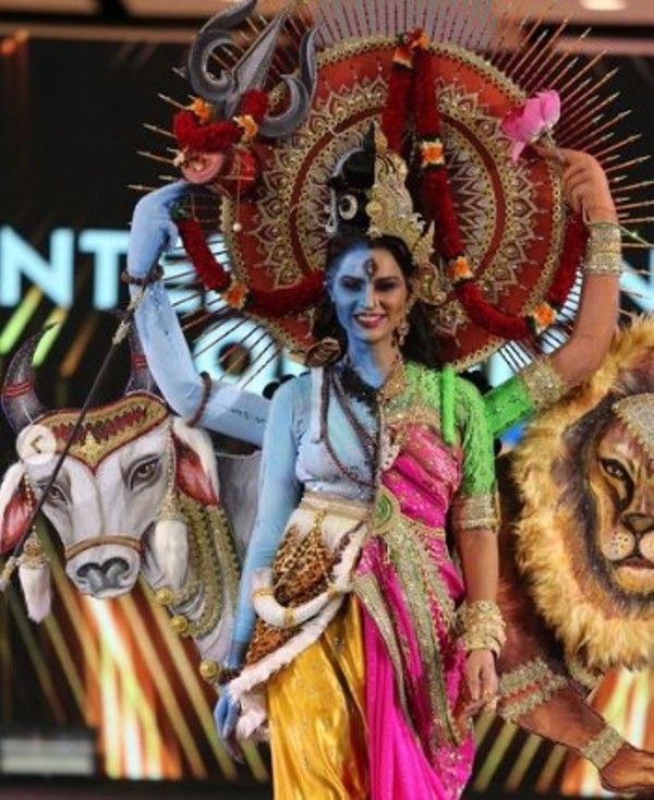 An image of Namitha Marimathu walking the ramp at the Miss International Queen pageant