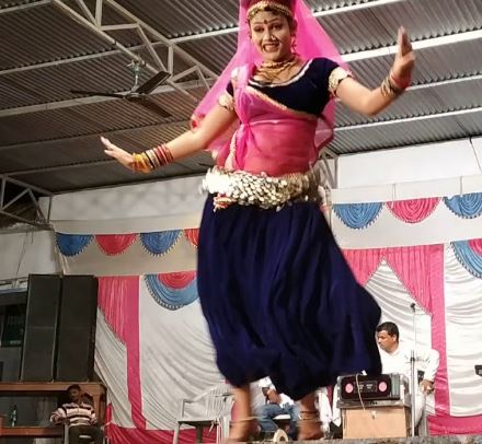 Gori Nagori while dancing on the stage in Rajasthani attire