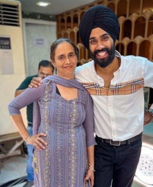 Prabhjot Singh with his mother