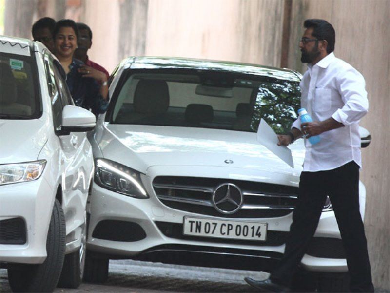 R. Sarathkumar walking past by his Mercedes-Benz C-Class car