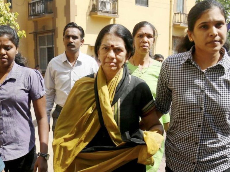 Rajani Pandit being picked up by the officials from her house in Dadar, Maharashtra, under the CDR scam