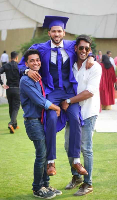 Rohit Shinde and his brothers, Niklesh Shinde (right) and Vikas Hazare (left)