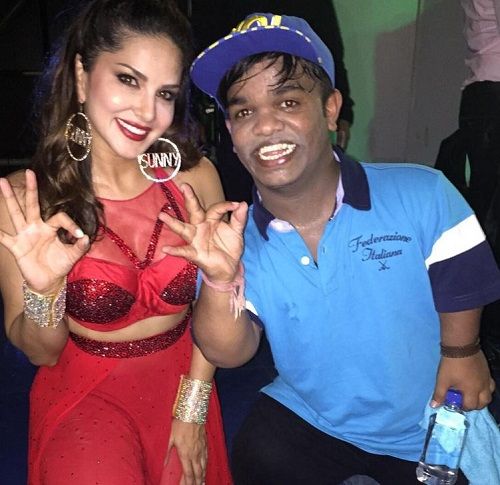 Vikas Sawant with Sunny Leone at an event