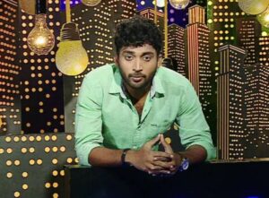 Vikraman Radhakrishnan in a still from the television show Nadanthathu Enna Kutramum Pinnaniyum on Vijay TV