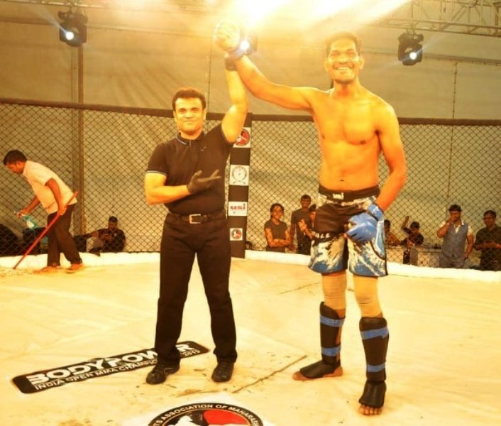 Yogesh Jadhav's photo taken after winning the BodyPower India Open MMA Championship