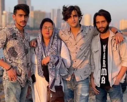Zayn Ibad Khan with his mother and brothers