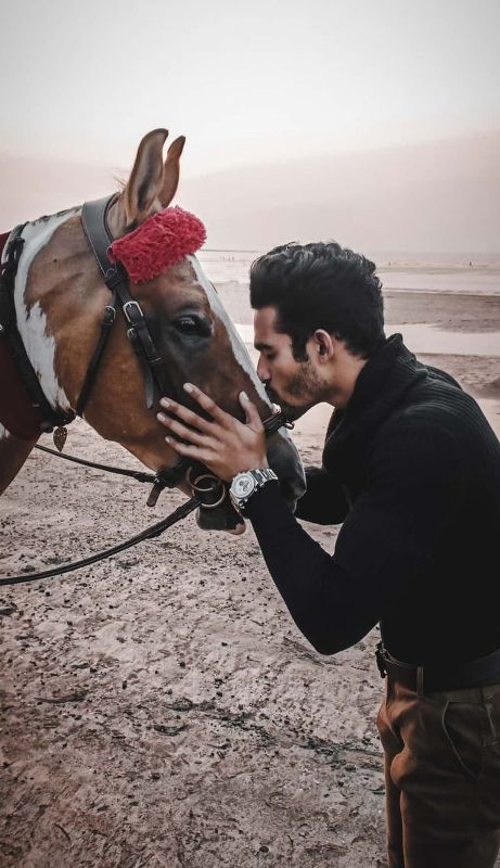Aagaz Akhtar with a horse