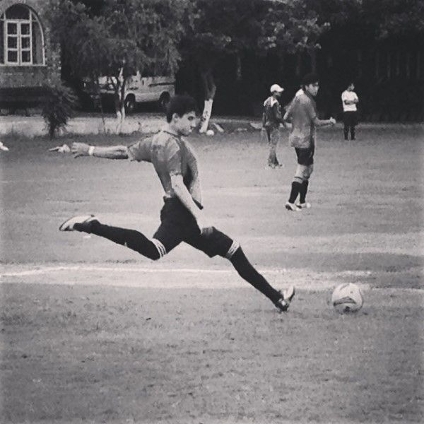 Hamid Barkzi playing football