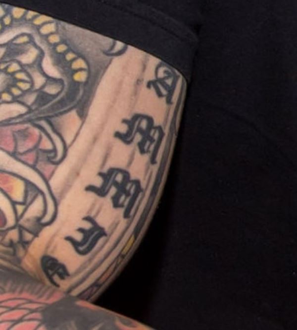 Jason David Frank's tattoo on inner side of his right bicep