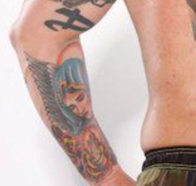 Jason David Frank's tattoo on inner side of left forearm