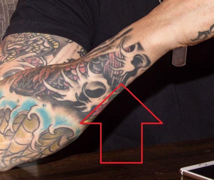 Jason David Frank's tattoo on right forearm