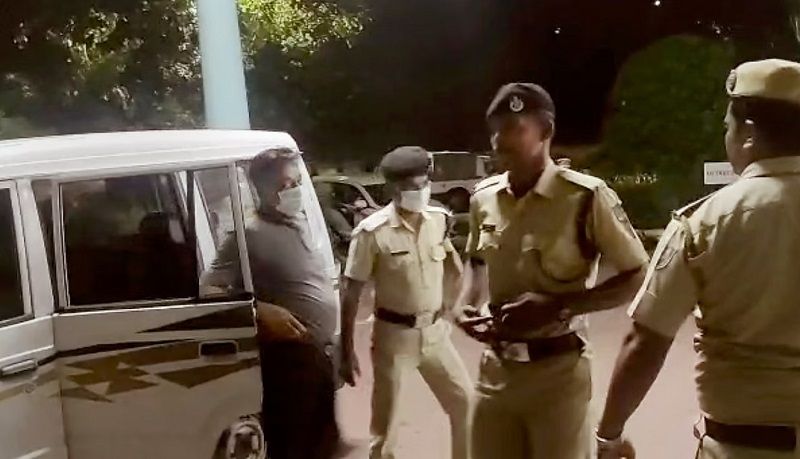 Jitendra Narain being taken to police custody