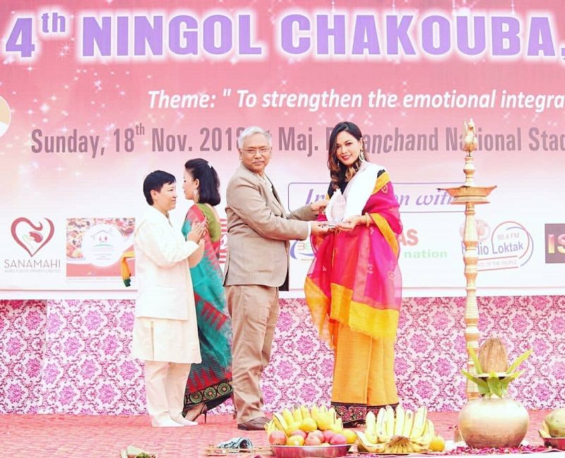 Lin Laishram receiving Recognition as one of women achievers from our state Manipur by United living and Ningol Chakkouba committee