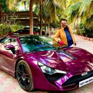 Naresh posing with his sports car, DC Avanti