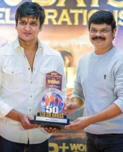 Nikhil Siddhartha posing with his 50 Days Shield Award for the film Kartikeya 2