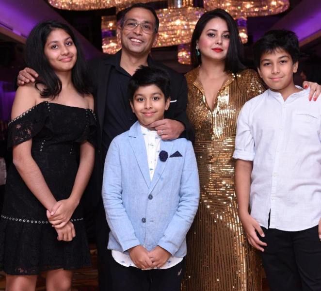 Rohini Acharya with her husband and children