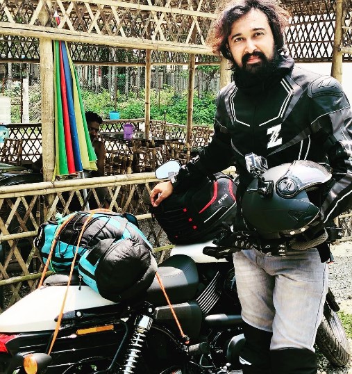 Sabyasachi Chowdhury posing with his Harley davidson