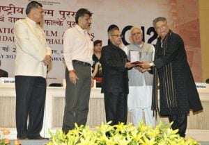 Vikram Gokhale receiving the National Award from the former President of India Pranab Mukherjee at the 60th National Film Awards
