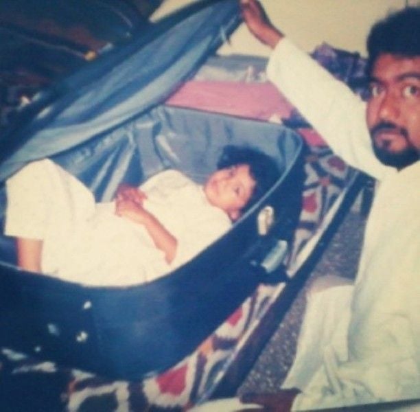 A childhood photo of Faria Abdullah with her father