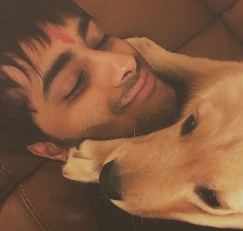 Aasmaan Bhardwaj and his pet dog