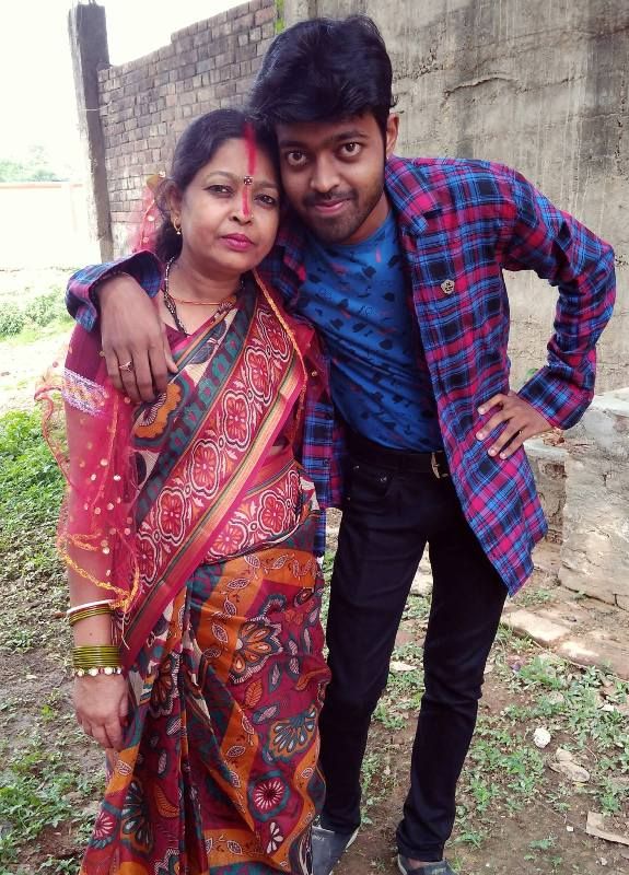 Adarsh Anand with his mother
