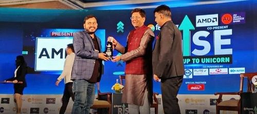 Alakh Pandey receiving an award from Piyush Goyal