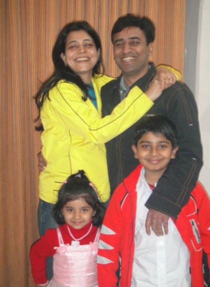 Amit Lodha with his wife and children