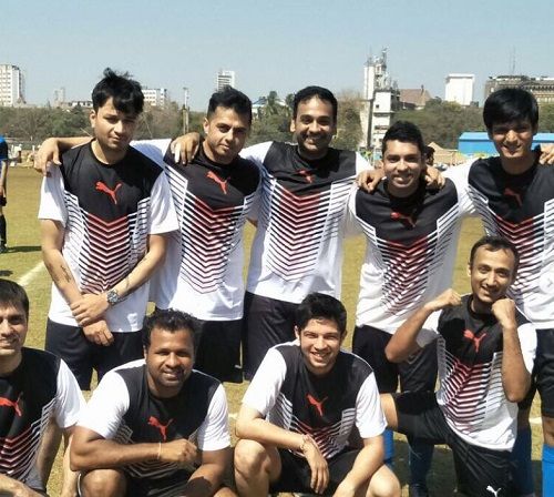 Bunty Sajdeh with his company's football team