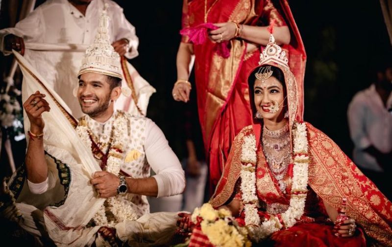Diganth Manchale with his wife, Aindrita Ray, on their wedding day