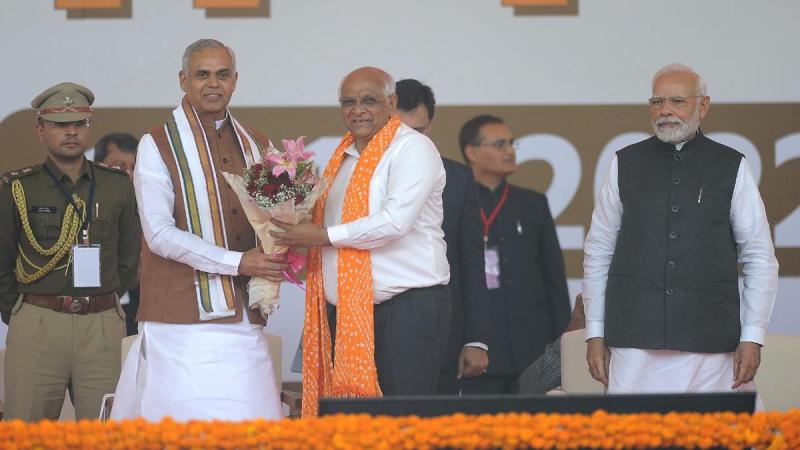 Gujarat Chief Minister Bhupendra Patel, Governor Acharya Devvrat, and Prime Minister Narendra Modi during the oath-taking ceremony of Mr. Patel in Gandhinagar on 12 December 2022