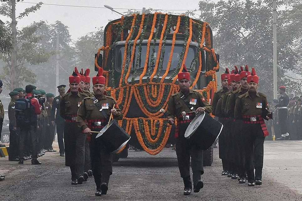 Mortal remains of J. F. R. Jacob being carried in a military truck