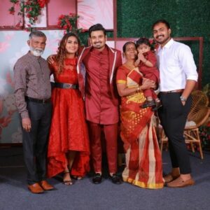 Myna Nandhini with her parents, brother, husband, and son