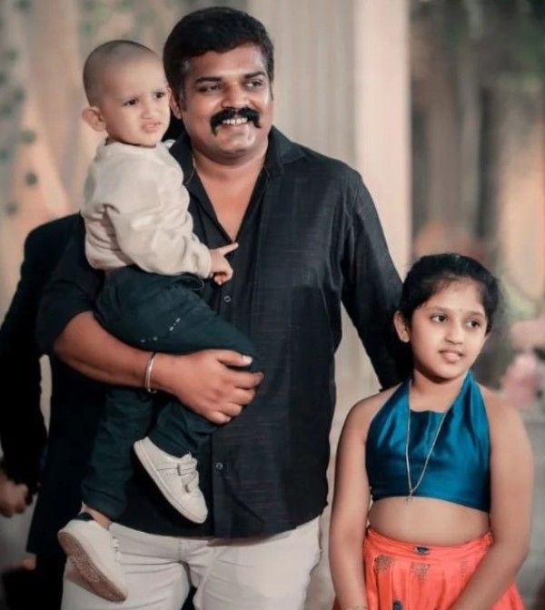 Parmod Shetty with his son and daughter
