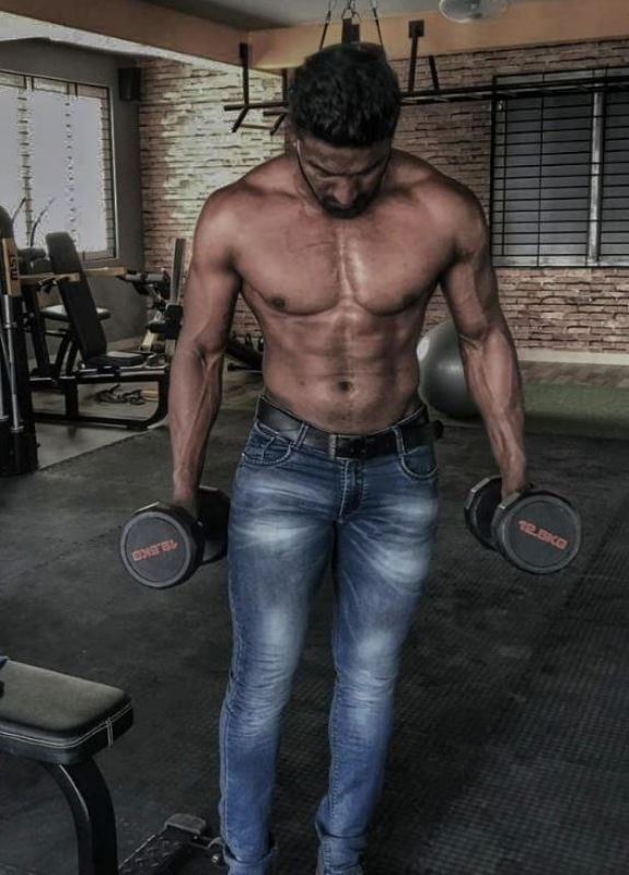 Rakshith Shetty while working out at the gym