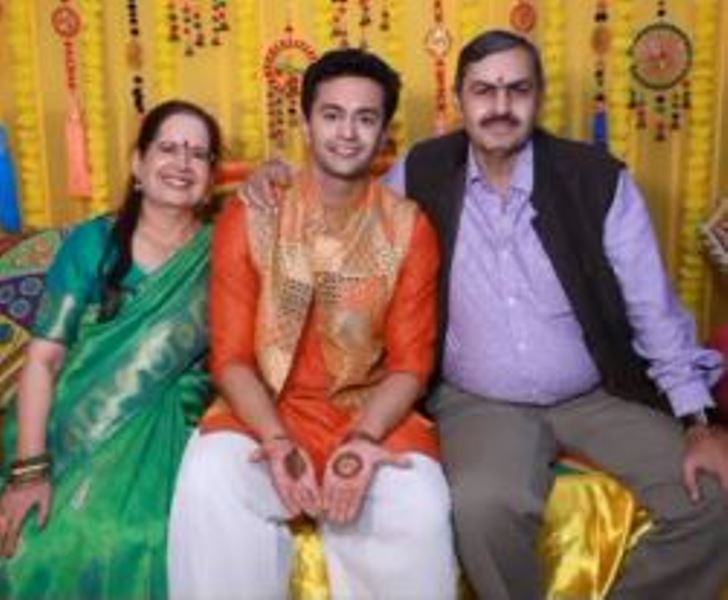 Varun Sharma with his parents