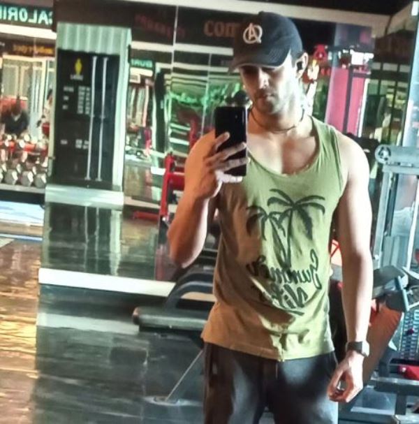 Varun Sharma working out in a gym