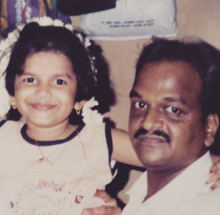 A childhood picture of Mitali with her father