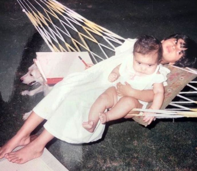 A childhood picture of Samiksha Pednekar (infant) with her sister, Bhumi Pednekar