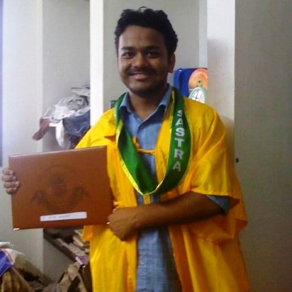 A photo of Kumar Varun taken with his Engineering degree