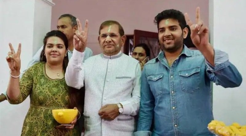 A photo of Sharad Yadav with his son and daughter