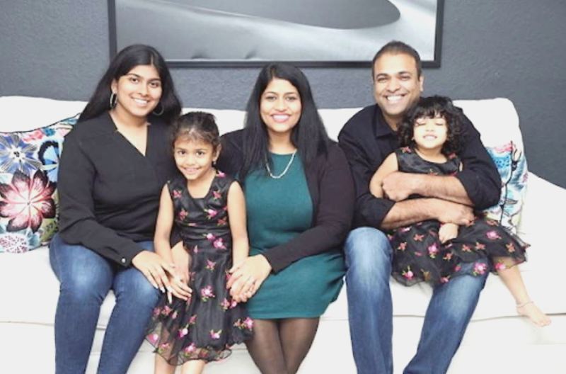Juli A Mathew with her husband and daughters
