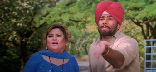 A still of Dolly Bindra from the Hindi film Dhamaal