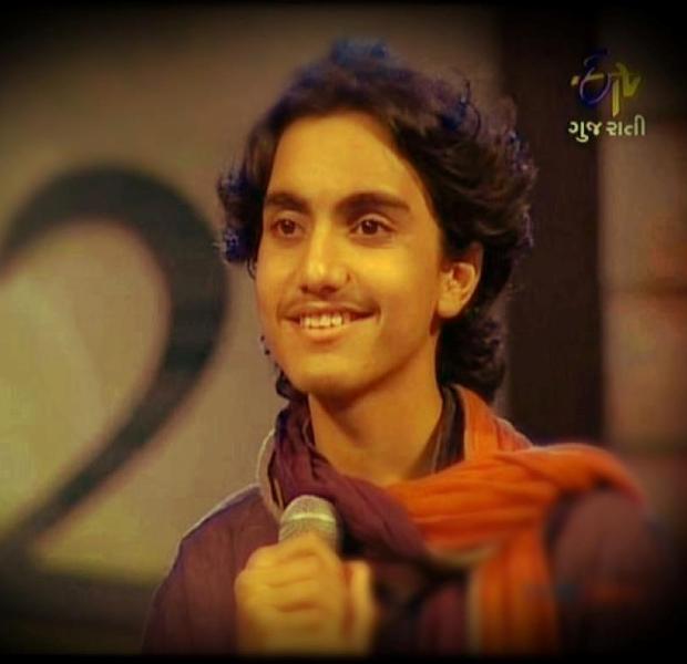 Aditya Gadhvi in a still from the Gujarati singing reality show Lok Gaayak Gujarat (2004) on ETV
