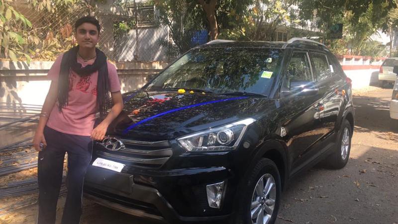 Aditya Gadhvi with his car