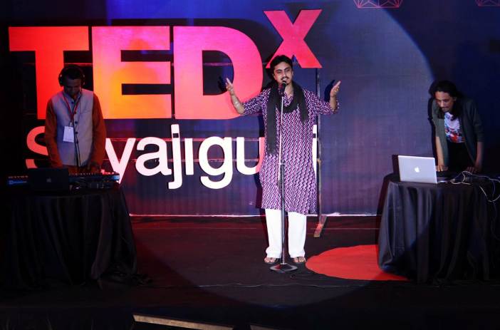 Aditya performing at a TEDx event in the Laxmi Vilas Palace of Vadodara, Gujarat