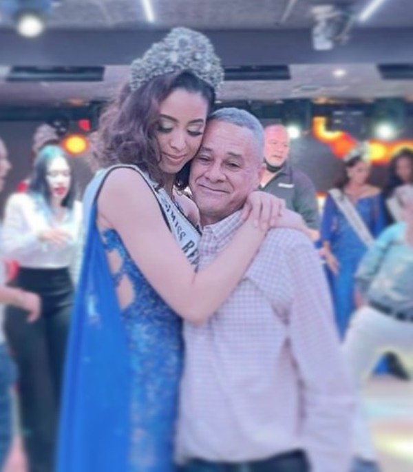 Andreína Martínez hugging her father
