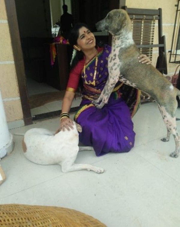 Atisha Naik with her adopted stray dogs