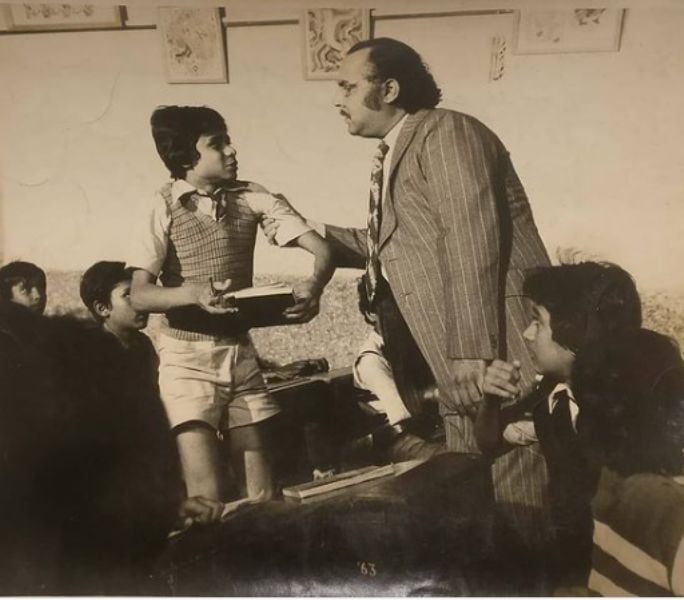 Azeem Bazmee (left) as a child actor in a still from his debut Bollywood film Kitaab (1977)
