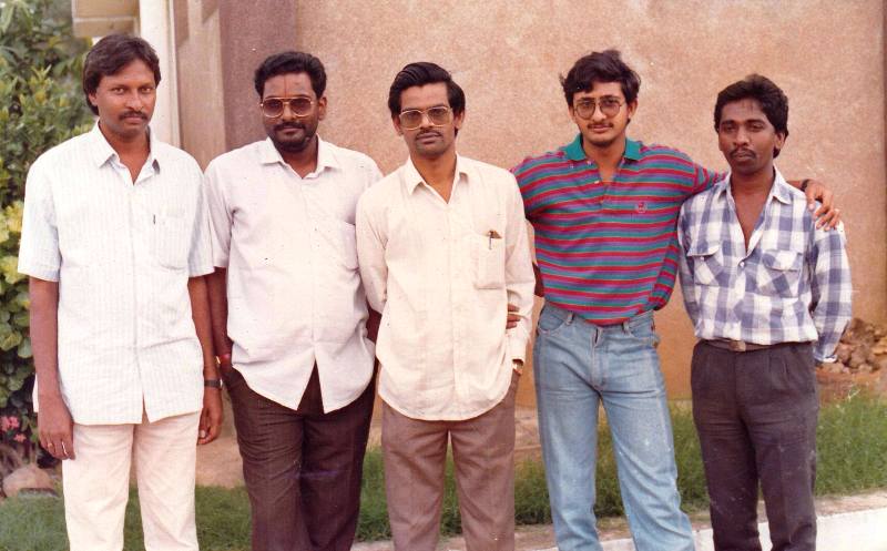 From left to right, Siva Nageswara Rao (director), M. M. Keeravani, Sirivennela Seetharama Sastry (lyricist), Teja (assistant director), and a crew member while they were working on the film Kshana Kshanam (1991)
