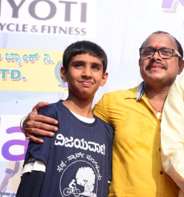 Naveen D. Padil with his son, Sudhanshu Rai